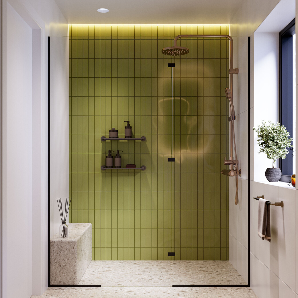 Olive green tile shower with brass fixtures